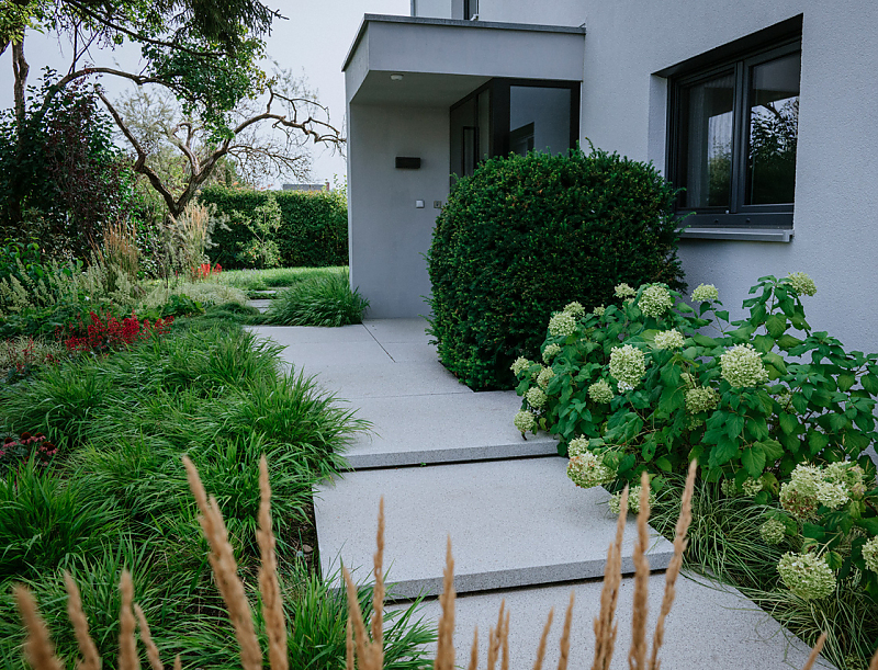 Eingangsbereich mit PODIUM ARCHITEKTUR Platten